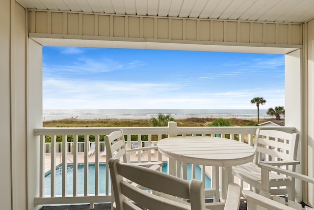 9600 Shore Dr Unit A-207, Myrtle Beach, SC 29572 - balcony with a water view and view of pool area