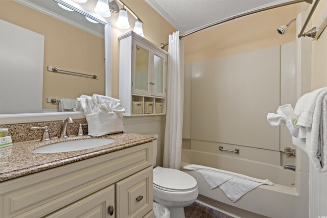 9600 Shore Dr Unit A-207, Myrtle Beach, SC 29572 - full bathroom with ornamental molding, toilet, shower / tub combo with curtain, vanity, and a textured ceiling