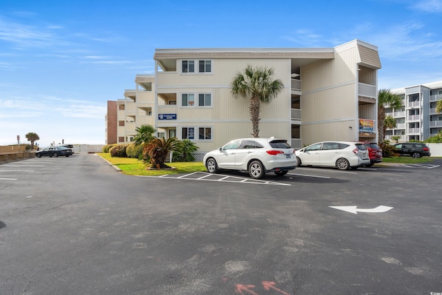9600 Shore Dr Unit A-207, Myrtle Beach, SC 29572 - view of apartment building / complex with uncovered parking