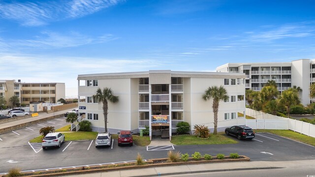 9600 Shore Dr Unit A-207, Myrtle Beach, SC 29572 - view of apartment building / complex with uncovered parking