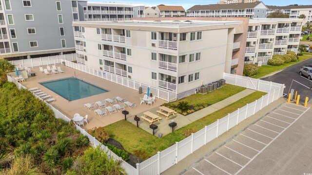 9600 Shore Dr Unit A-207, Myrtle Beach, SC 29572 - view of apartment building / complex with a community pool and central AC