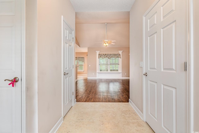 406 Pritchard St, Myrtle Beach, SC 29588 - hallway featuring baseboards, tile patterned floors, and lofted ceiling