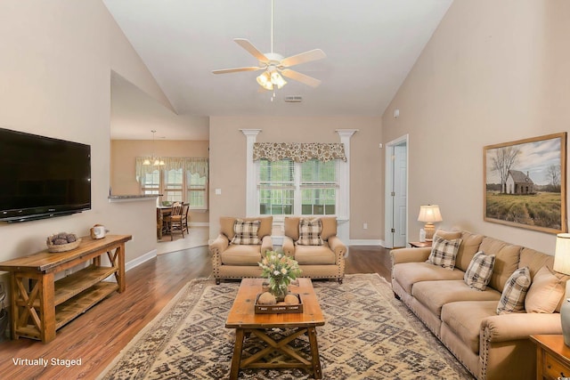 406 Pritchard St, Myrtle Beach, SC 29588 - living area with high vaulted ceiling, ceiling fan with notable chandelier, and wood finished floors