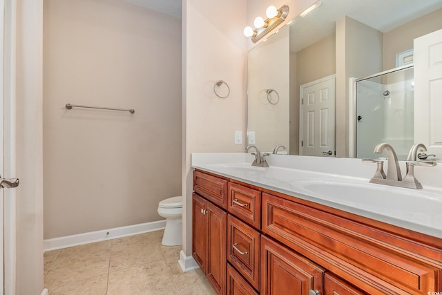 406 Pritchard St, Myrtle Beach, SC 29588 - full bathroom with double vanity, a sink, a stall shower, and toilet