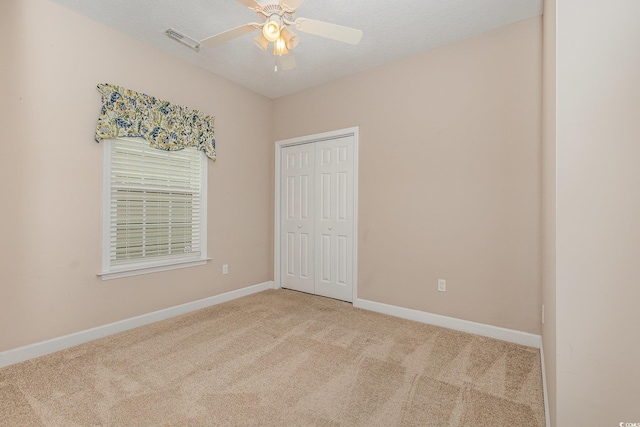 406 Pritchard St, Myrtle Beach, SC 29588 - spare room featuring visible vents, baseboards, ceiling fan, and light carpet