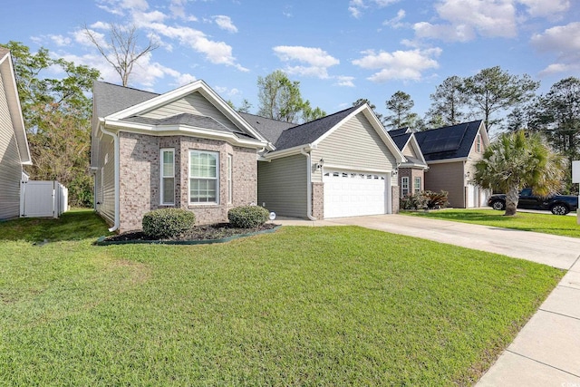 406 Pritchard St, Myrtle Beach, SC 29588 - ranch-style house featuring a garage, concrete driveway, a front lawn, and brick siding