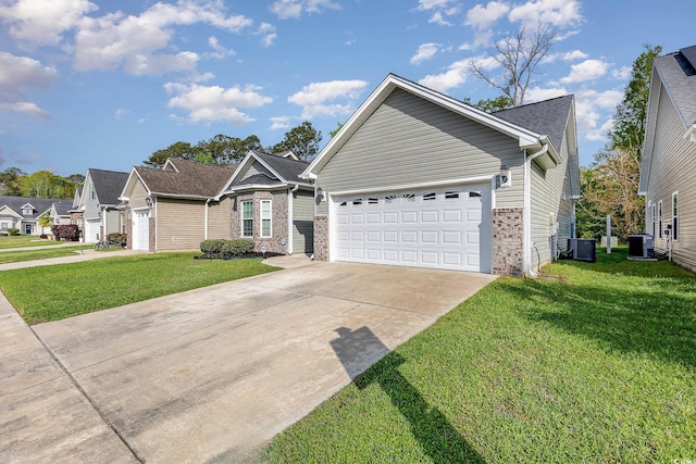 406 Pritchard St, Myrtle Beach, SC 29588 - single story home with central AC, a front lawn, brick siding, a garage, and concrete driveway