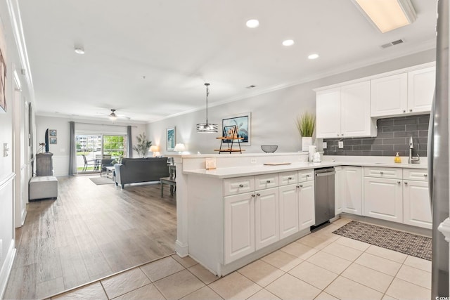 4861 Luster Leaf Cir Unit 104, Myrtle Beach, SC 29577 - kitchen with a peninsula, open floor plan, dishwasher, light countertops, and recessed lighting