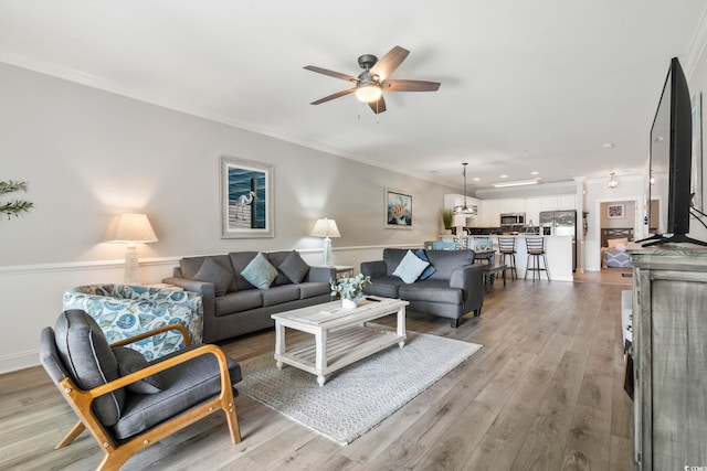 4861 Luster Leaf Cir Unit 104, Myrtle Beach, SC 29577 - living area featuring ceiling fan, ornamental molding, light wood-type flooring, and recessed lighting
