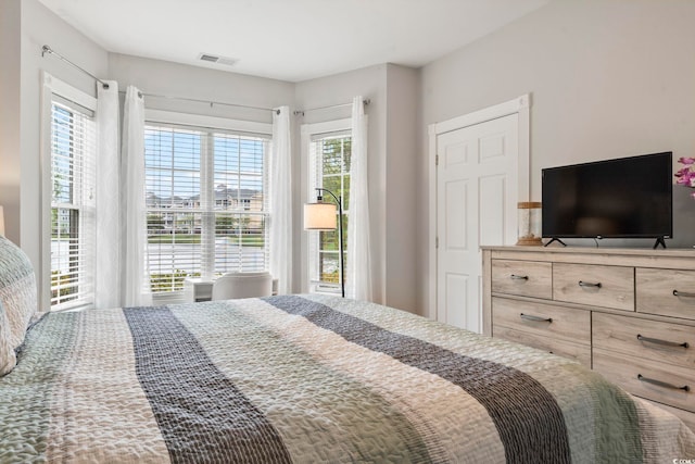 4861 Luster Leaf Cir Unit 104, Myrtle Beach, SC 29577 - bedroom with multiple windows