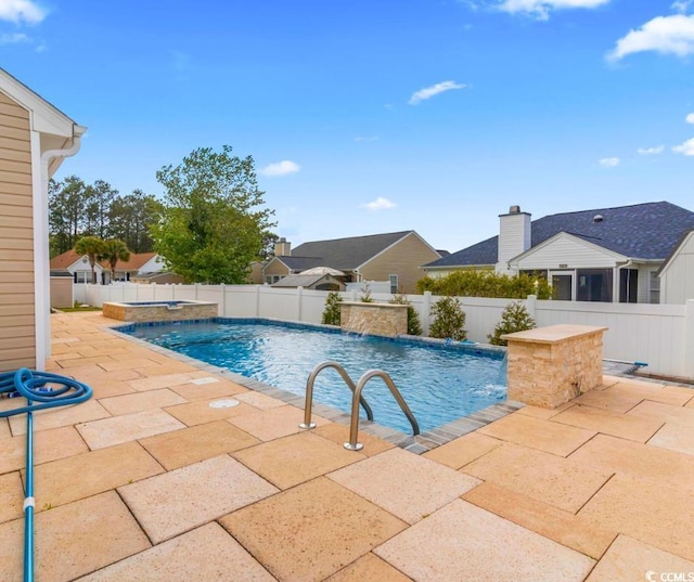 601 Seth Ln, Longs, SC 29568 - view of swimming pool featuring a patio, a fenced backyard, and a pool with connected hot tub