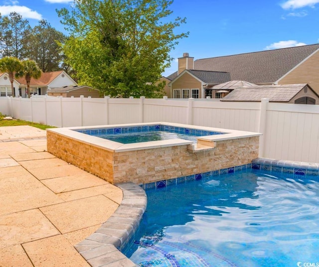 601 Seth Ln, Longs, SC 29568 - view of pool featuring an in-ground hot tub and a patio area