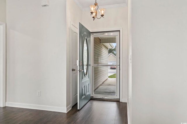 601 Seth Ln, Longs, SC 29568 - foyer entrance with dark wood finished floors, crown molding, a chandelier, and baseboards