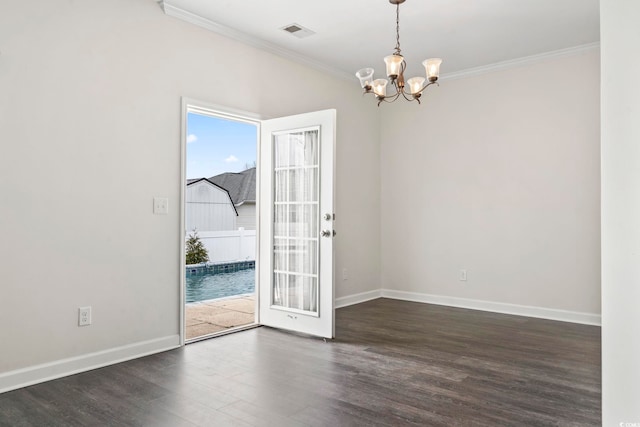 601 Seth Ln, Longs, SC 29568 - spare room featuring a chandelier, ornamental molding, dark wood-style flooring, and baseboards