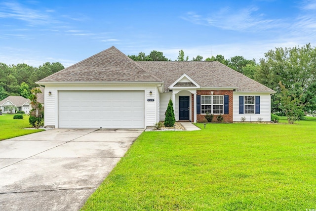 232 Marbella Dr, Murrells Inlet, SC 29576 - view of front of home featuring a front lawn, concrete driveway, an attached garage, and a shingled roof