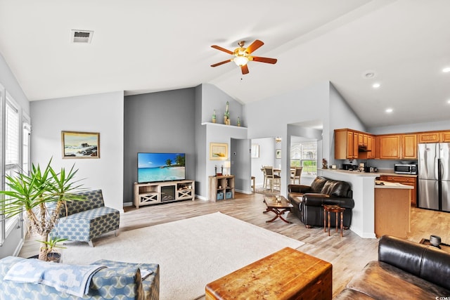 232 Marbella Dr, Murrells Inlet, SC 29576 - living room featuring ceiling fan, light wood-style floors, and high vaulted ceiling