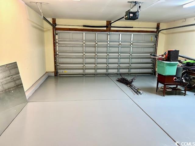 232 Marbella Dr, Murrells Inlet, SC 29576 - garage with a garage door opener