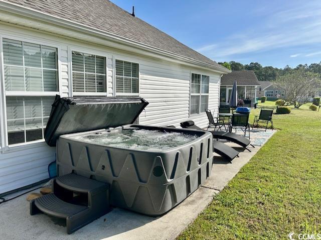 232 Marbella Dr, Murrells Inlet, SC 29576 - view of patio / terrace with a hot tub