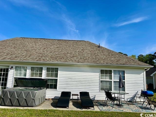 232 Marbella Dr, Murrells Inlet, SC 29576 - rear view of house featuring a patio and a shingled roof