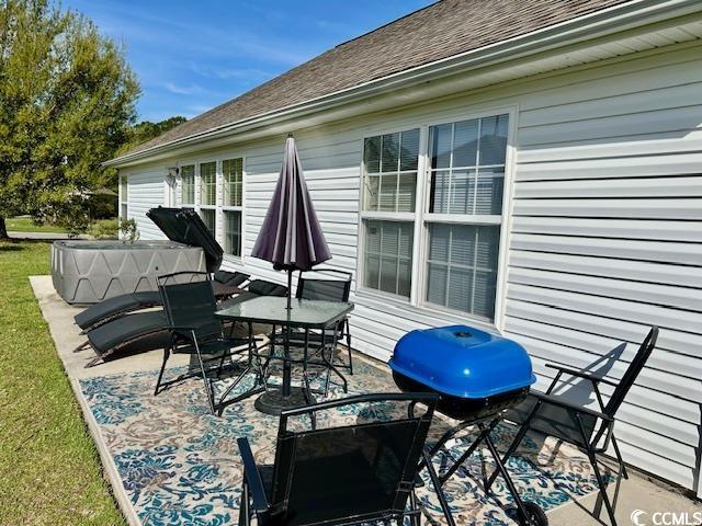 232 Marbella Dr, Murrells Inlet, SC 29576 - wooden terrace with a patio area, a grill, and outdoor dining area