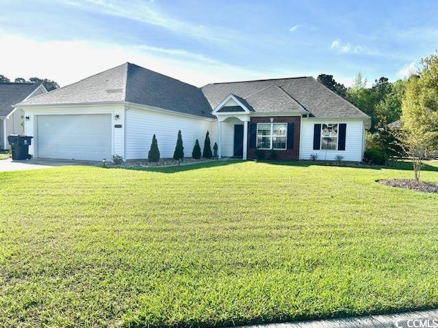 232 Marbella Dr, Murrells Inlet, SC 29576 - view of front of property with an attached garage, a front lawn, and driveway