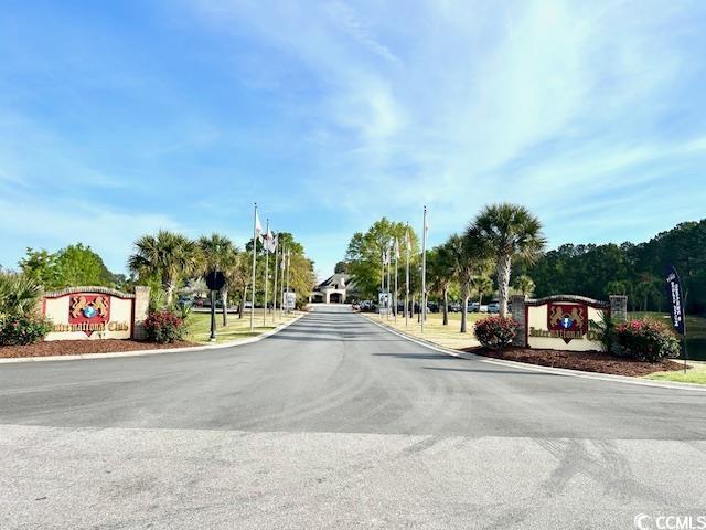 232 Marbella Dr, Murrells Inlet, SC 29576 - view of asphalt road with curbs