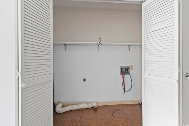 laundry room with laundry area, hookup for an electric dryer, and washer hookup