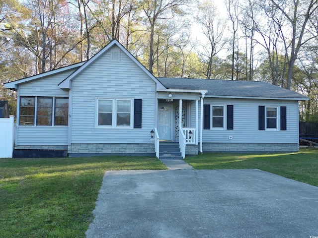 1208 Mackie Cir, Myrtle Beach, SC 29579 - view of front of property featuring a shingled roof and a front lawn