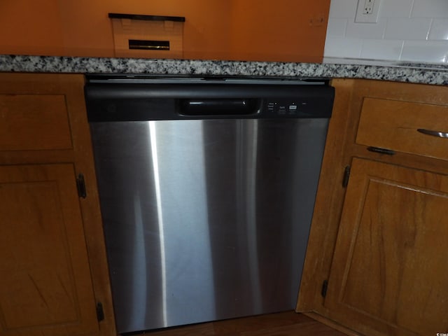 1208 Mackie Cir, Myrtle Beach, SC 29579 - kitchen view of stainless steel dishwasher and brown cabinetry