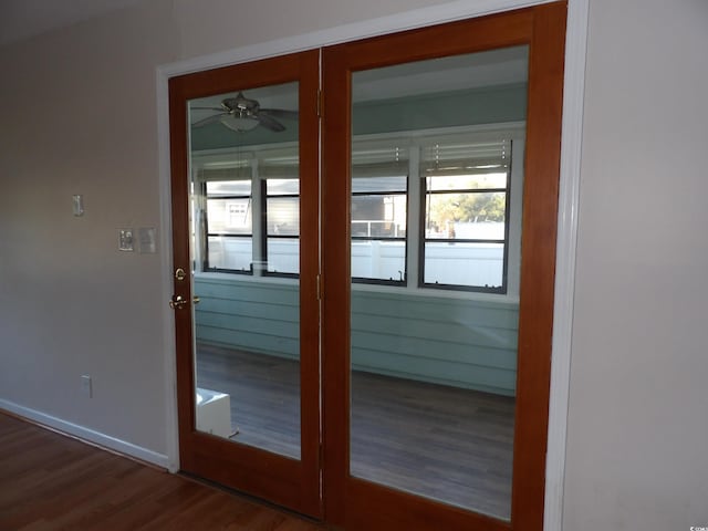 1208 Mackie Cir, Myrtle Beach, SC 29579 - doorway to outside featuring wood finished floors, ceiling fan, and baseboards
