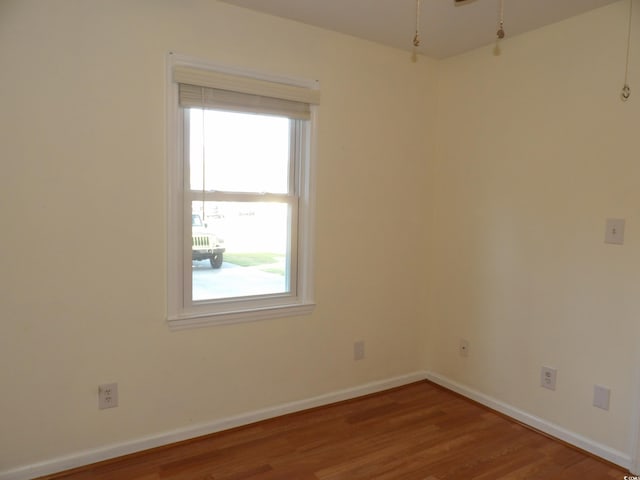 1208 Mackie Cir, Myrtle Beach, SC 29579 - spare room with wood finished floors and baseboards