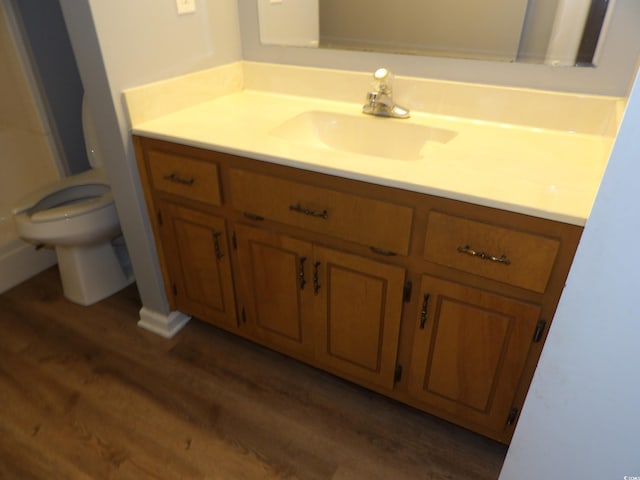 1208 Mackie Cir, Myrtle Beach, SC 29579 - bathroom with wood finished floors, vanity, and toilet