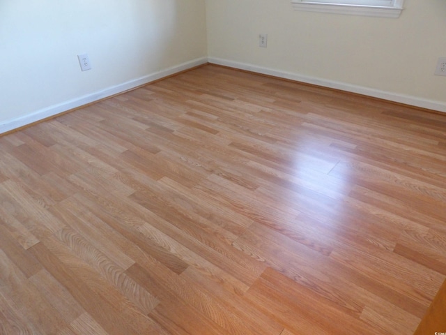 1208 Mackie Cir, Myrtle Beach, SC 29579 - spare room featuring light wood-style flooring and baseboards