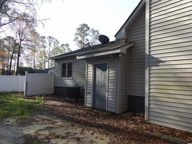 1208 Mackie Cir, Myrtle Beach, SC 29579 - view of property exterior featuring cooling unit and fence