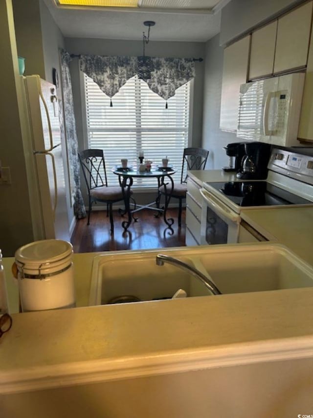 4396 Baldwin Ave Unit C-24, Little River, SC 29566 - kitchen with white appliances, wood finished floors, and light countertops