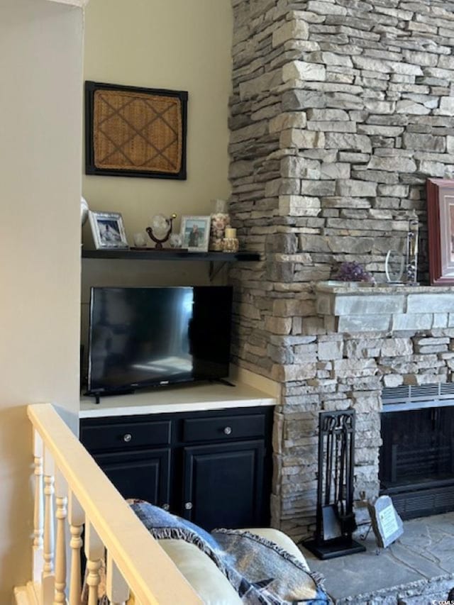 4396 Baldwin Ave Unit C-24, Little River, SC 29566 - living room featuring a stone fireplace