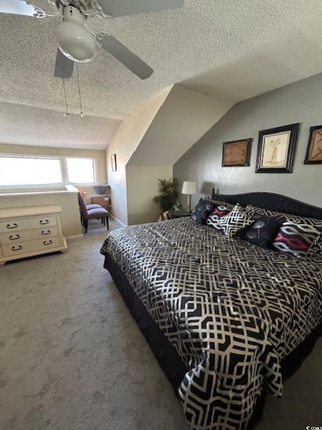 4396 Baldwin Ave Unit C-24, Little River, SC 29566 - bedroom with carpet flooring, a textured ceiling, and a ceiling fan