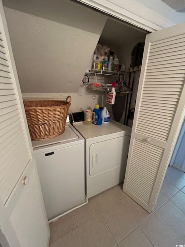 4396 Baldwin Ave Unit C-24, Little River, SC 29566 - laundry room with washer and clothes dryer and light tile patterned flooring