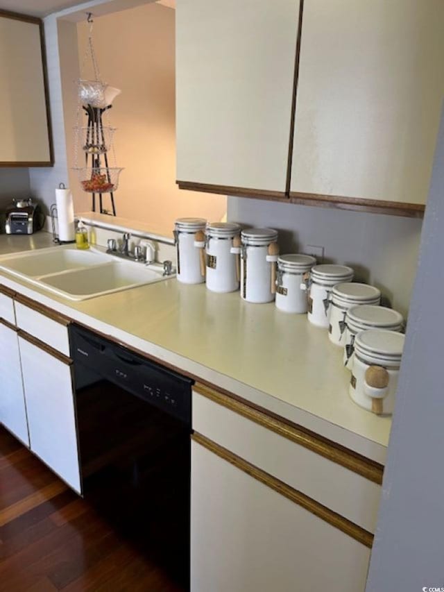 4396 Baldwin Ave Unit C-24, Little River, SC 29566 - kitchen with black dishwasher, a sink, light countertops, and white cabinets