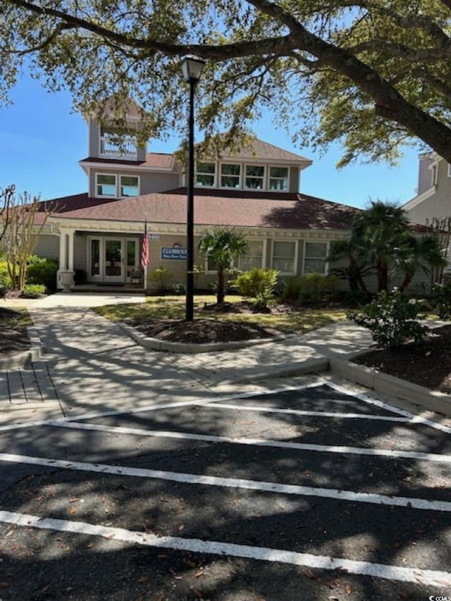 4396 Baldwin Ave Unit C-24, Little River, SC 29566 - view of front of home with uncovered parking and french doors