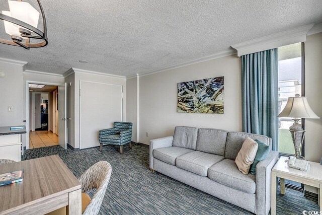 1105 S Ocean Blvd Unit 502, Myrtle Beach, SC 29577 - living area featuring ornamental molding, carpet flooring, and a textured ceiling