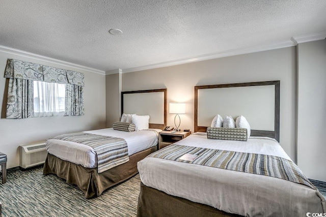 1105 S Ocean Blvd Unit 502, Myrtle Beach, SC 29577 - bedroom featuring ornamental molding, a textured ceiling, and an AC wall unit