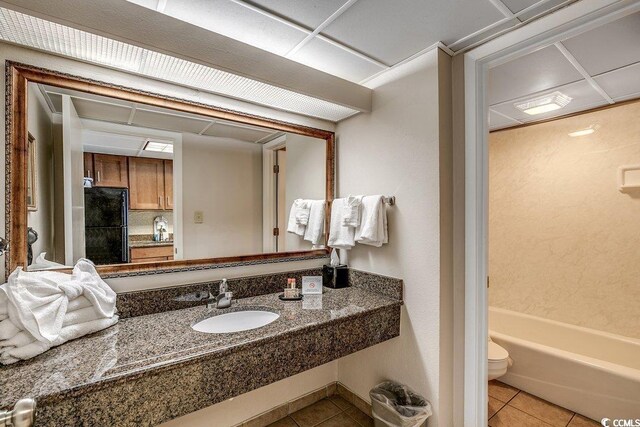 1105 S Ocean Blvd Unit 502, Myrtle Beach, SC 29577 - full bath with a sink, tile patterned flooring, and toilet
