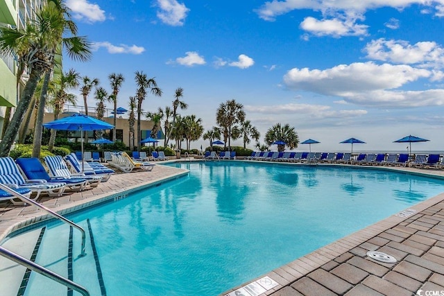 1105 S Ocean Blvd Unit 502, Myrtle Beach, SC 29577 - community pool with a patio area
