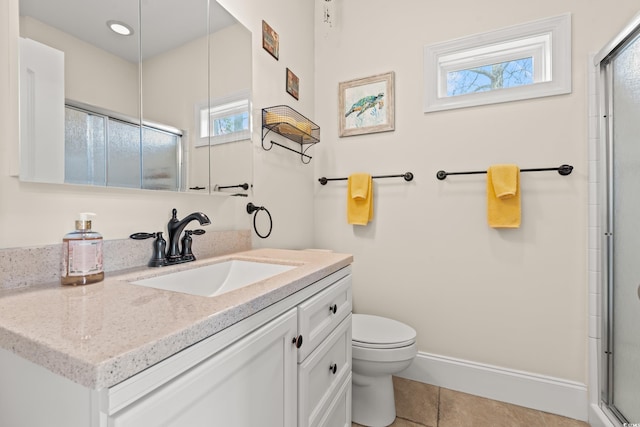 2039 Woodburn Dr, Myrtle Beach, SC 29579 - full bathroom with toilet, vanity, tile patterned flooring, and an enclosed shower