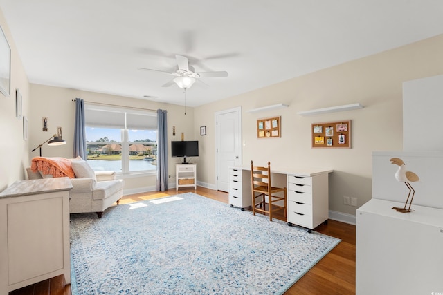 2039 Woodburn Dr, Myrtle Beach, SC 29579 - living room with wood finished floors, ceiling fan, and baseboards