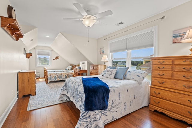 2039 Woodburn Dr, Myrtle Beach, SC 29579 - bedroom with wood-type flooring, vaulted ceiling, baseboards, ceiling fan, and recessed lighting