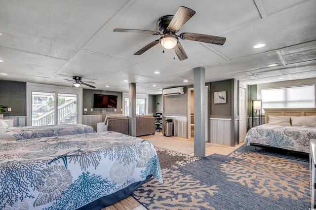 bedroom featuring access to outside, a wall unit AC, multiple windows, and recessed lighting