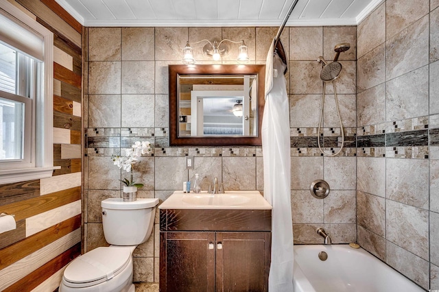 full bathroom with tasteful backsplash, shower / bathtub combination with curtain, vanity, toilet, and tile walls