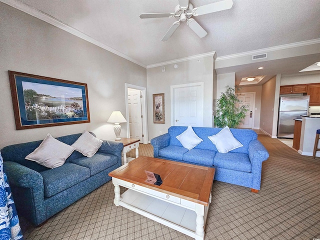 living room featuring light carpet, visible vents, a ceiling fan, and crown molding